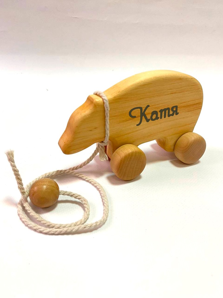 Дерев'яна іграшка Ведмедик на колесиках