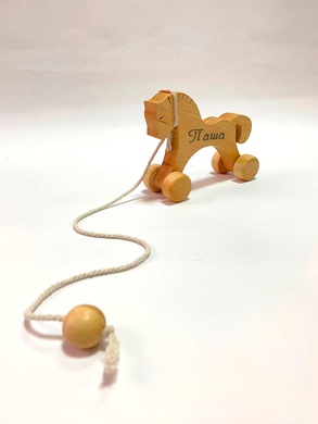 Дерев'яна іграшка-каталка Коник на колесиках